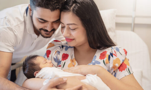 parents with newborn baby,