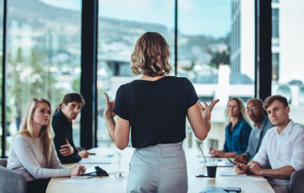 Female manager leading a team meeting
